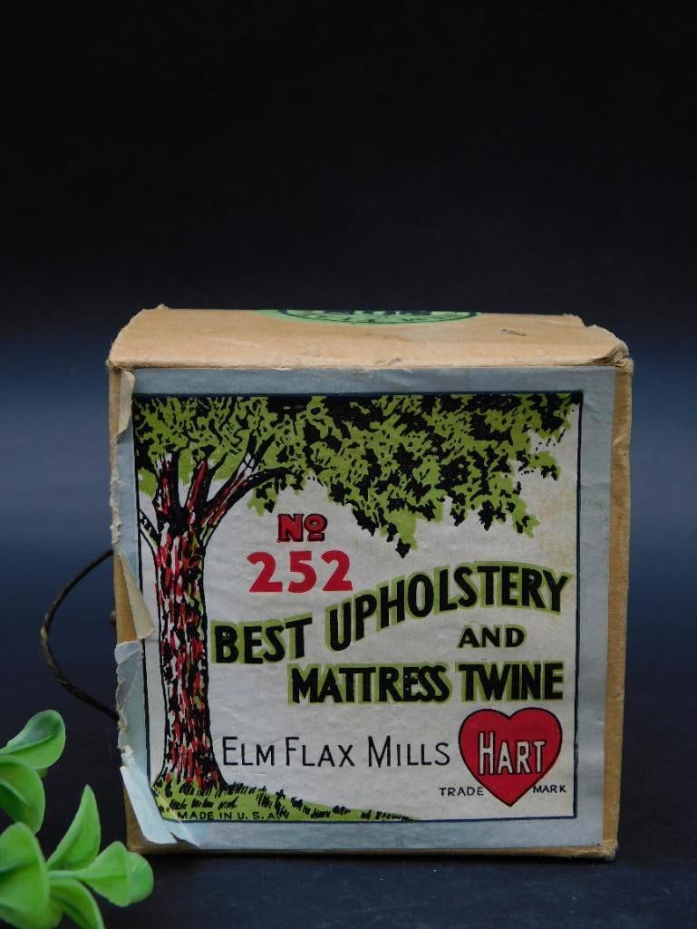 Elm Flax Mills No. 252 Upholstery and Mattress Twine Box: Original box of No. 252 upholstery and mattress twine by Elm Flax Mills. The box appears sealed with an original label and seal intact. The box features a decorative label with product details, includ
