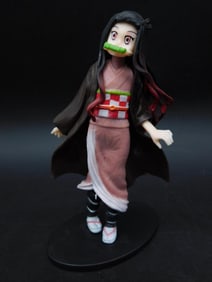 Anime-Inspired Female Character Figurine With Stand