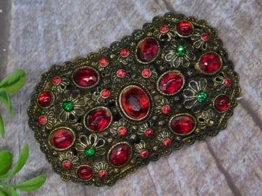 1920s Brooch with Red and Green Stones and Brass Frame