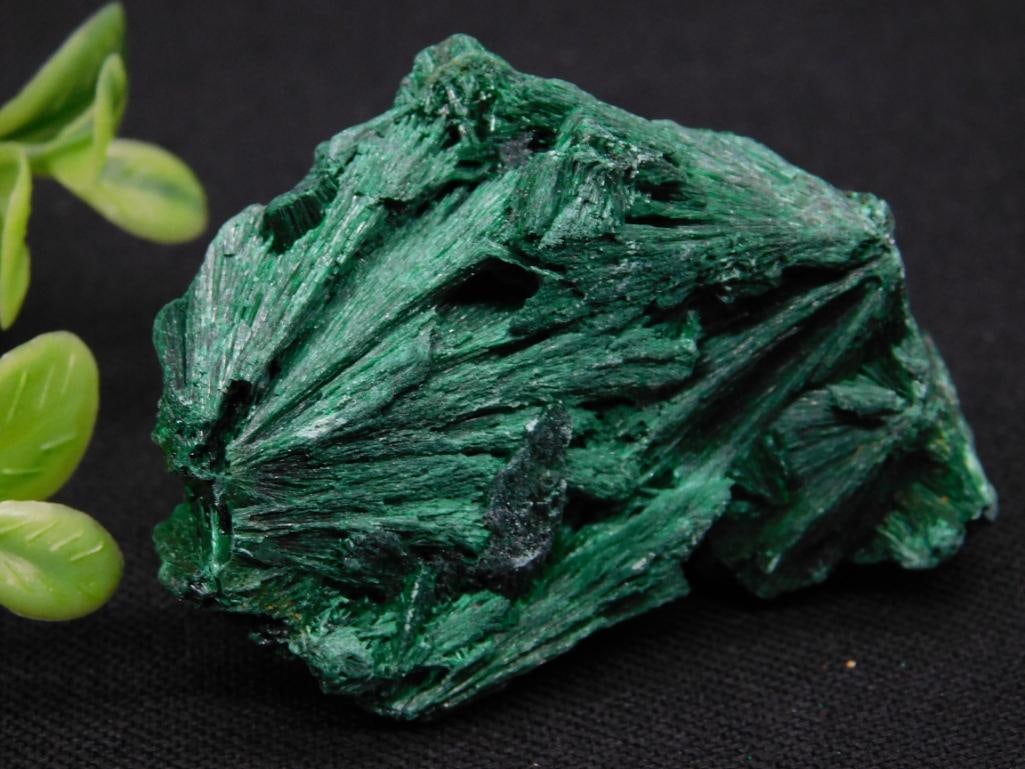Malachite Mineral Specimen Weighing 58 Grams Rock Stone Lapidary Specimen: This auction features a malachite mineral specimen weighing 58 grams. The deep green mineral displays its natural crystal formations and texture. Please note the size relative to the coin included in