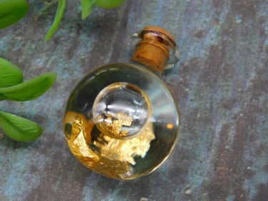 GOLD FLAKES IN BOTTLE ROCK STONE LAPIDARY SPECIMEN