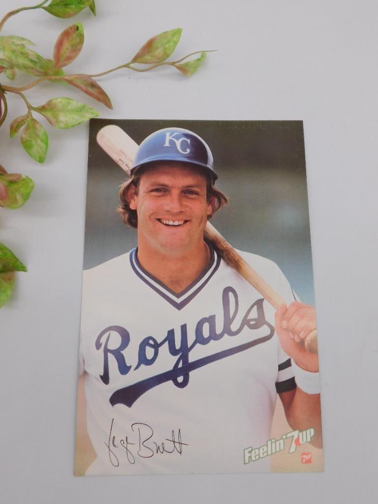 George Brett Feelin' 7up Promo Card: George Brett promotional card from the Feelin' 7up campaign, featuring a front image of Brett in a Royals uniform holding a bat, with 'Feelin' 7up' branding on the bottom corner. The back includes a b