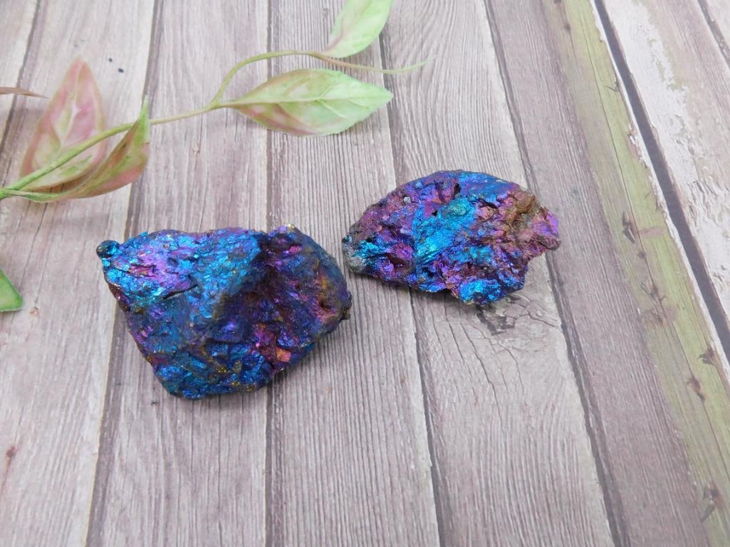 Chalcopyrite Peacock Ore Mineral Specimens, 102 Grams: Two pieces of chalcopyrite peacock ore mineral specimens weighing a total of 102 grams. Known for their vivid iridescence with shades of blue, purple, and gold. Ideal for collectors or geological enth