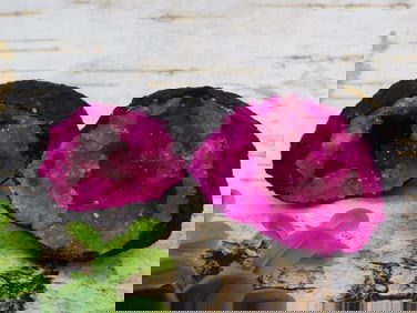 Bright Pink Quartz Geode with Black Outer Shell