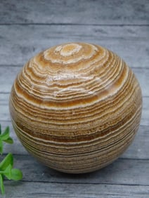 Polished Brown Onyx Sphere with Natural Striations