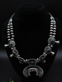 Silver-Tone Necklace With Crescent Pendant and Embellished Details
