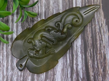 Carved Jade Stone Pendant with Animal Motif