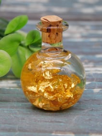 GOLD FLAKES IN BOTTLE ROCK STONE LAPIDARY SPECIMEN