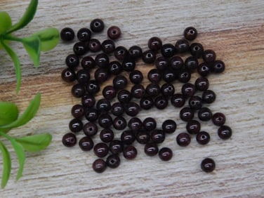 Small Dark Garnet Beads Weighing 16 Grams