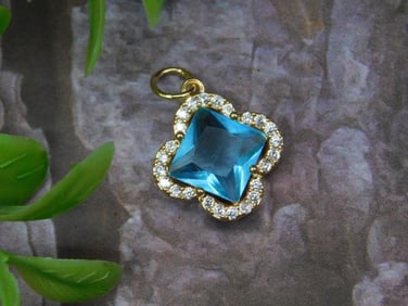 Gold-Tone Pendant With Blue Stone and Clear Accents