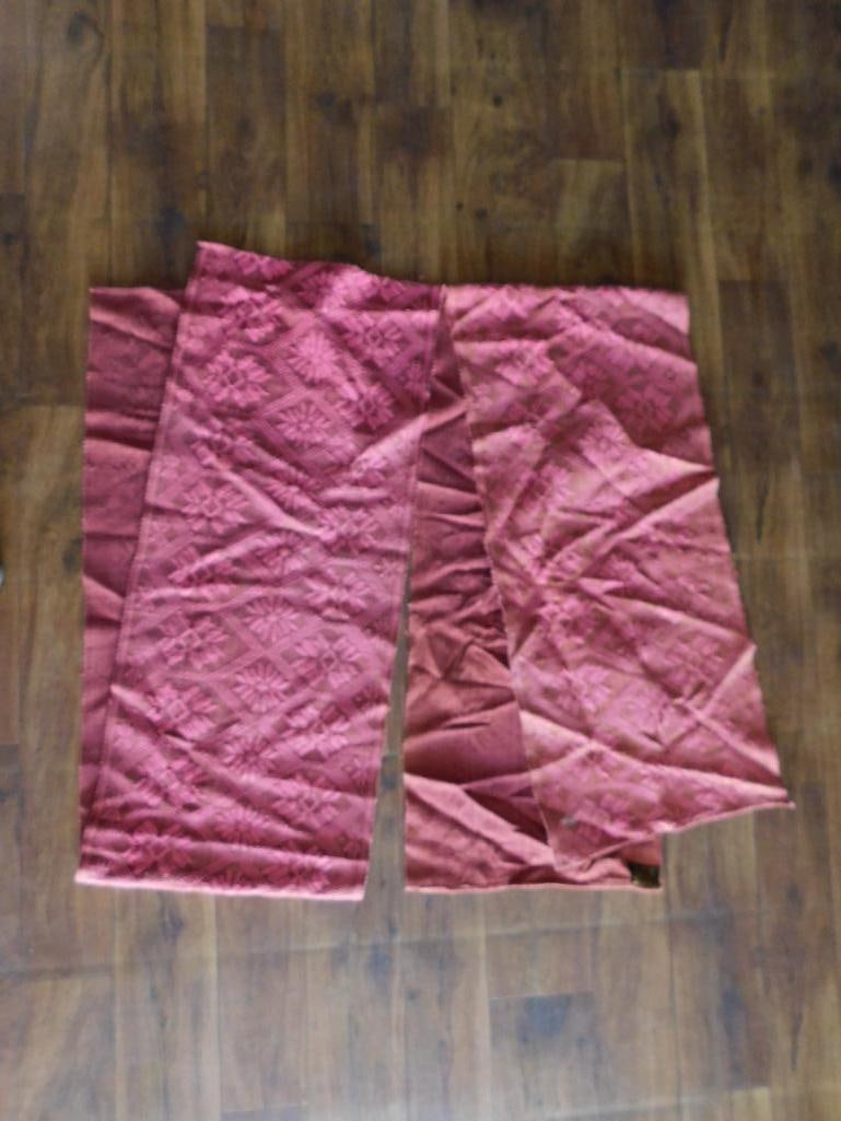 Peruvian Handmade Pink Fabric Length: Peruvian handmade fabric in pink hue with diamond and floral-patterned design. Includes label indicating "Hand Made in Peru" by AAA. Measures approximately 6 feet 3/4 inches in one direction. Items sh