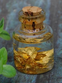 Small Glass Bottle with 22 K Gold Flakes in Liquid