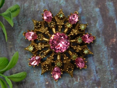 Gold-Tone Pink Rhinestone Brooch With Leaf Design