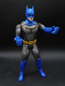 Action Figure with Blue and Black Batman-Themed Design