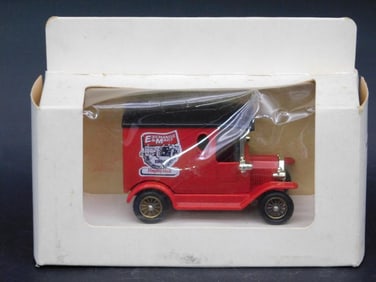 Die-Cast Red Vehicle Model in Original Packaging