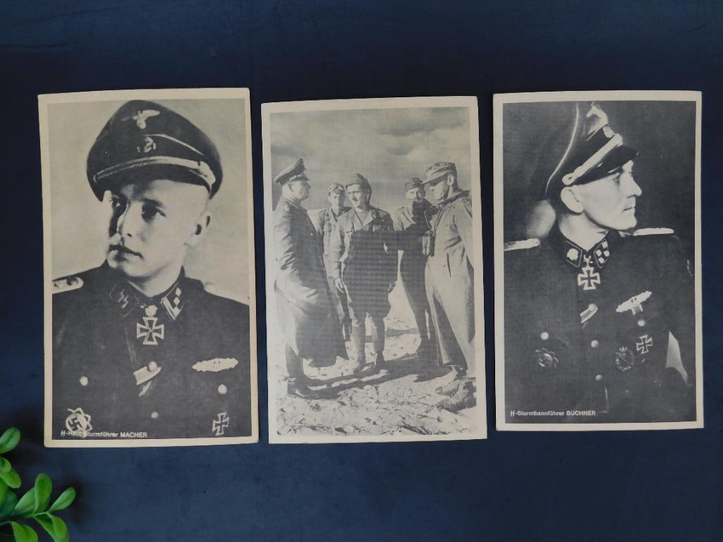 Set of Three WWII German Military Postcards: A collection of three black-and-white WWII-era German military-themed postcards. Each features a photograph of individuals in military uniforms. The reverse sides show typical unused space for writing