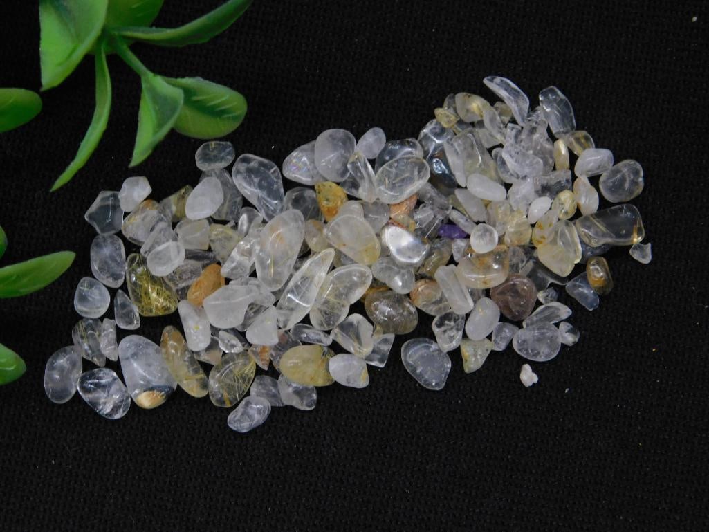 12 Grams of Rutilated Quartz Gemstones ROCK STONE LAPIDARY SPECIMEN: A lot of rutilated quartz stones weighing 12 grams. These tumbled stones display natural patterns, variations, and inclusions. Perfect for collectors or enthusiasts seeking natural crystal specimens.