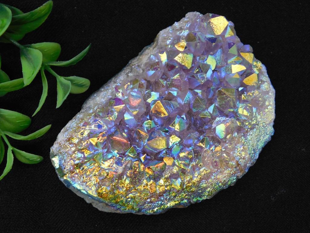 Angel Aura Amethyst Cluster Rock Stone Lapidary Specimen: A stunning quartz crystal geode cluster with an iridescent aura treatment. Displays a vibrant play of colors including gold, purple, and blue. Measures approximately 178 grams in weight. Perfect for c