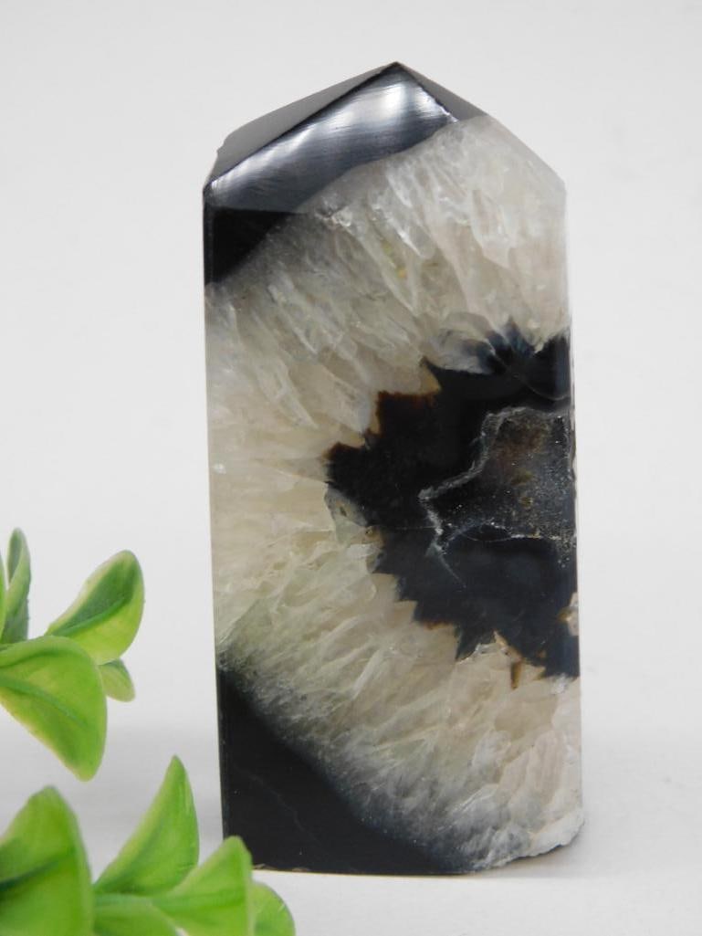 Geode Crystal Tower With Dark Center Rock Stone Lapidary Specimen: This is a geode crystal point featuring a natural dark center surrounded by lighter crystal formations. The piece is polished with one pointed end and one flat base for display. Suitable for decorativ