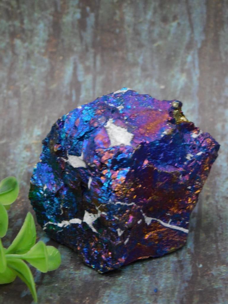 Iridescent Chalcopyrite Peacock Ore Mineral Specimen With White Matrix Rock Stone Lapidary Specimen: This lot features an iridescent chalcopyrite mineral specimen displaying vibrant metallic hues. The mineral is accented by a white matrix, adding contrast to its iridescence. Ideal for mineral enthusi