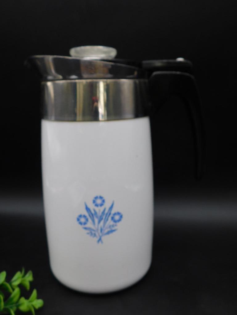 Corning Ware 10-Cup Coffee Percolator with Glass Lid: This 10-cup Corning Ware coffee percolator features the classic blue floral pattern design and comes complete with its stainless steel and glass construction. It is marked "Corning Ware, 10 Cup," and 