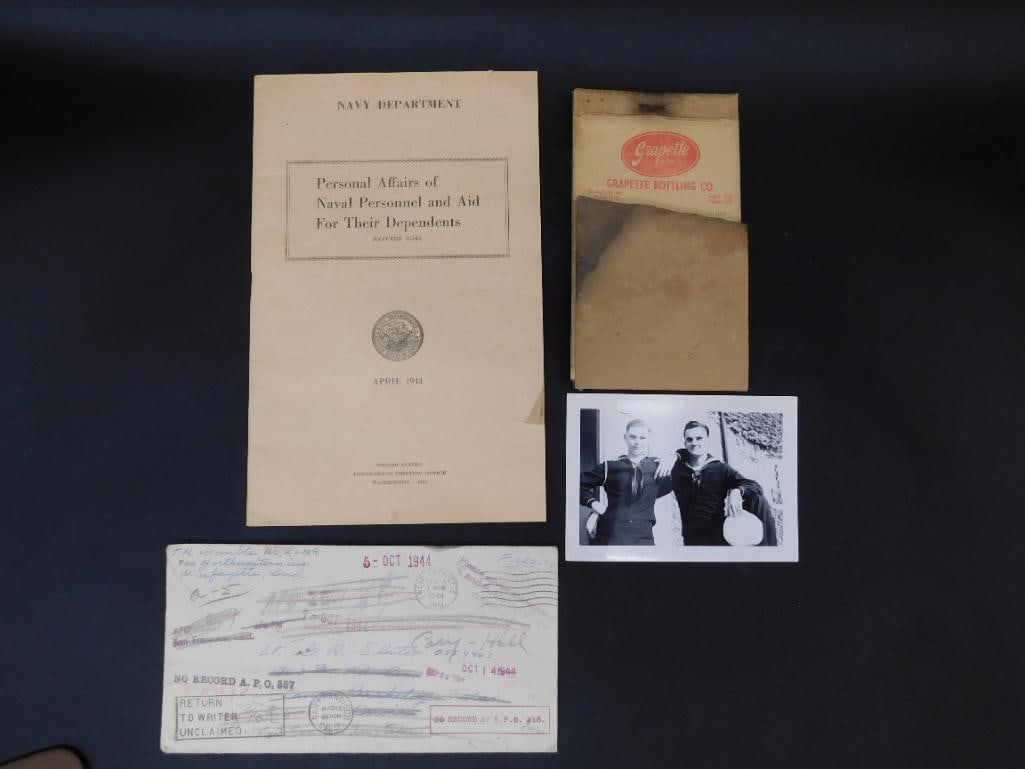 Group of WWII-Era Naval Documents and Ephemera: This lot includes a selection of naval and wartime items from the WWII era. It features a Navy Department manual titled 'Personal Affairs of Naval Personnel and Aid for Their Dependents' dated April 1
