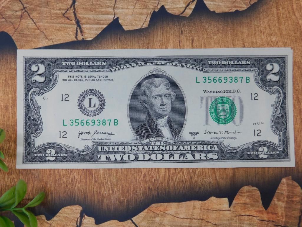 10 Sequential $2 Federal Reserve Notes: Collection of 10 sequential $2 Federal Reserve Notes featuring Thomas Jefferson on the obverse. Each note bears the same 2017 series designation. Sequential serial numbers run from L35669387B to L3566