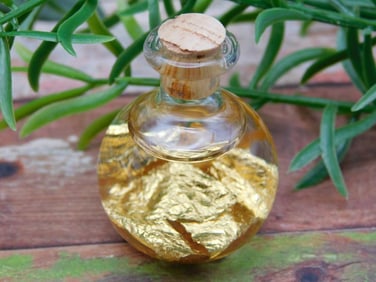 GOLD FLAKES IN BOTTLE ROCK STONE LAPIDARY SPECIMEN