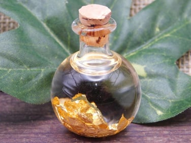 GOLD FLAKES IN BOTTLE ROCK STONE LAPIDARY SPECIMEN