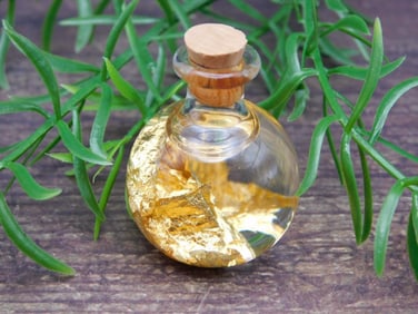 GOLD FLAKES IN BOTTLE ROCK STONE LAPIDARY SPECIMEN