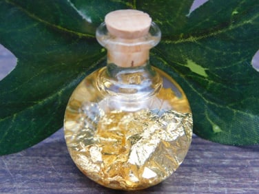 GOLD FLAKES IN BOTTLE ROCK STONE LAPIDARY SPECIMEN