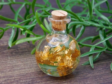 GOLD FLAKES IN BOTTLE ROCK STONE LAPIDARY SPECIMEN