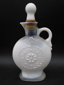 White Glass Decanter with Embossed Pattern and Stopper