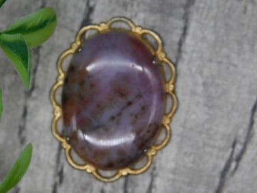 Oval Stone Brooch With Gold-Tone Frame