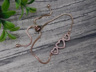 Rose Gold-Tone Bracelet With Heart Accents