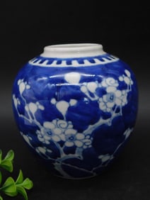 Blue and White Ceramic Vase with Floral Design