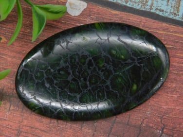 Polished Dark Green Cabochon with Patterns