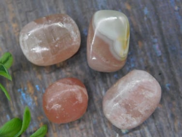 Set of Four Polished Stones with Variegated Colors
