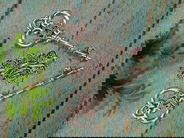 Set of Decorative Silver-Tone Metal Keys and Ornament