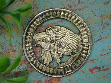 Metal Token Featuring Eagle Motif and Inscription