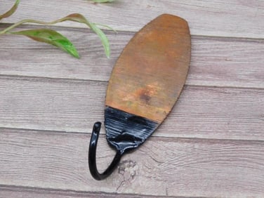 Rustic Handheld Metal Tool With Curved Hook