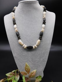 Shell and Bead Necklace With Black and White Tones