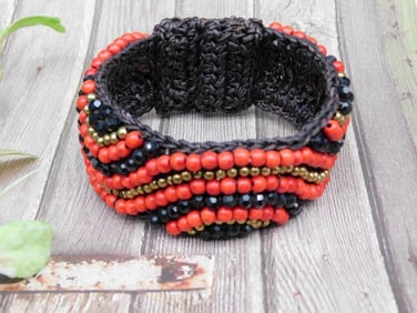 Black Braided Bracelet with Red, Gold, and Black Beads