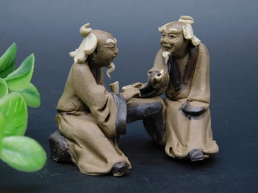 Asian Figurines Depicting Two Scholars in Conversation