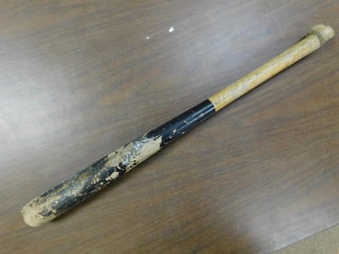 Wooden Baseball Bat With Worn Paint and Tape Wrap