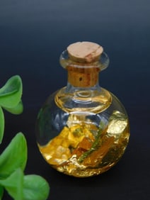 Small Glass Bottle With Gold Flakes and Cork Stopper
