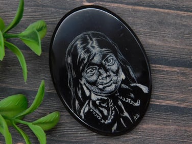Engraved Oval Stone Pendant Featuring a Portrait