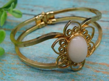 Gold-Tone Bracelet with Oval White Stone Centerpiece