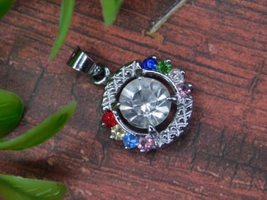 Round Crystal Pendant With Multicolored Accents