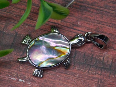 Silver-Toned Turtle Pendant With Iridescent Shell